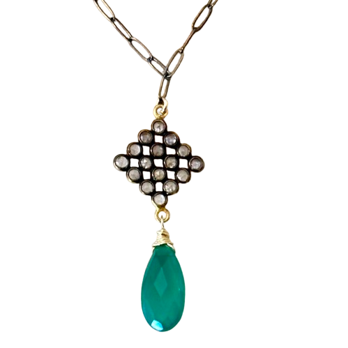 Gold necklace with diamond-shaped white topaz cluster and green onyx teardrop pendant.