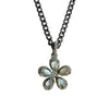 Flower pendant on a gun metal chain